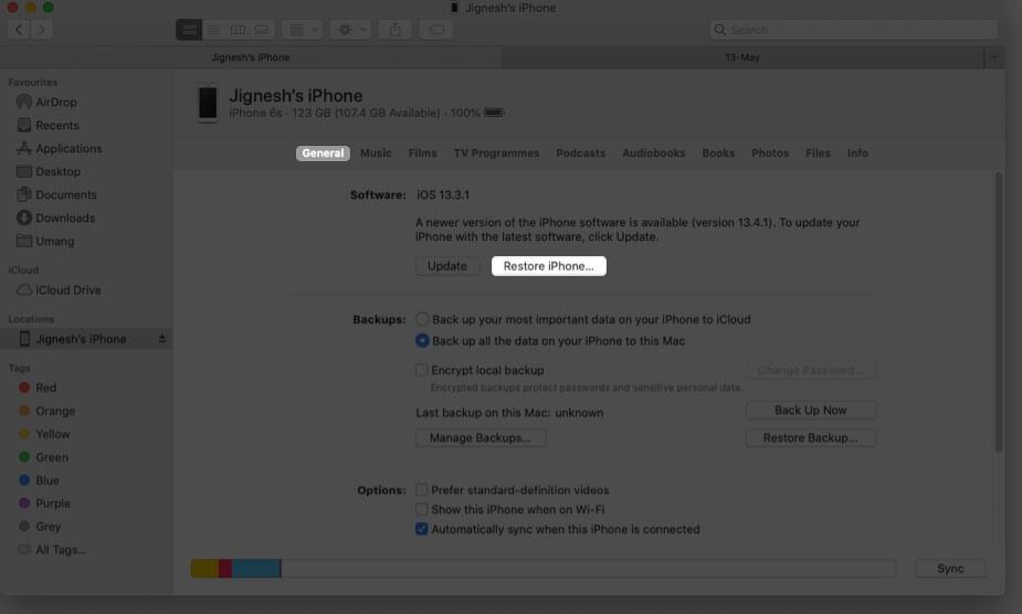 Goto General and Click on Restore iPhone on Mac