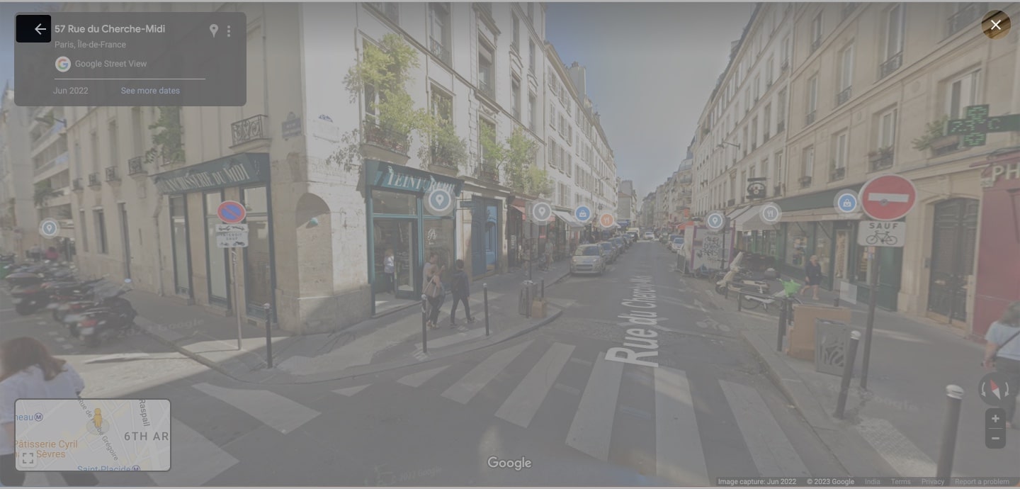 Click the back icon or cross icon to exit the street view in google maps