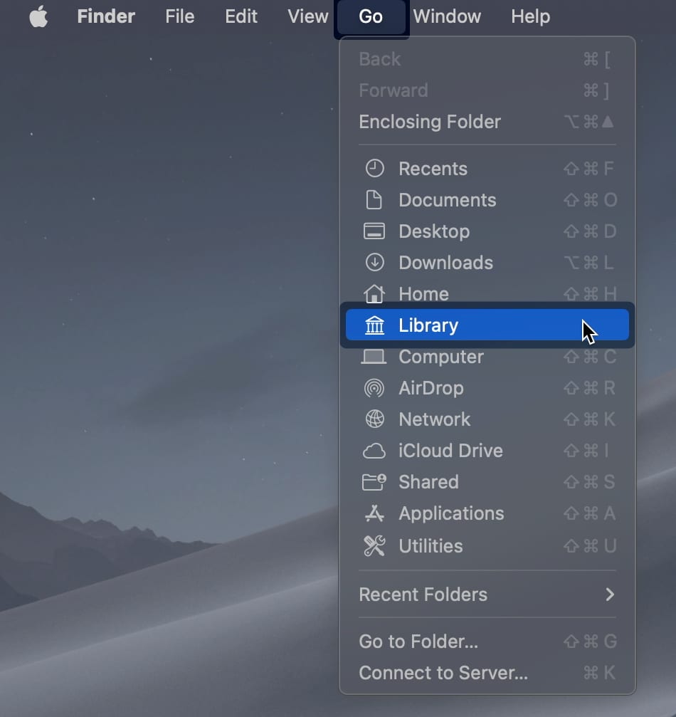 Click on Go and select Library
