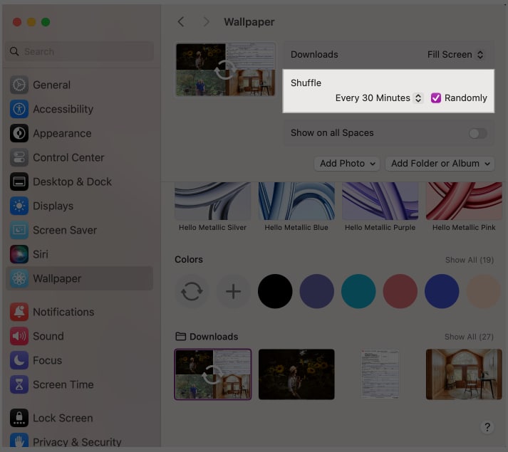 Enabling the Shuffle option for live wallpapers in the macOS System Settings app
