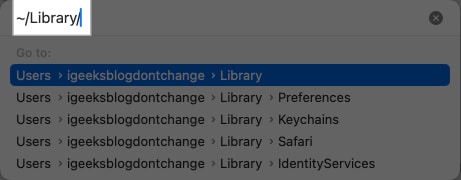 Looking up the Library folder in the Go to Folder window on a Mac