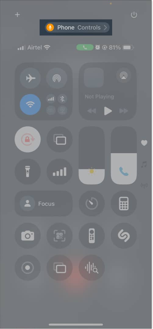 Checking which app is using iPhone's microphone from the iOS Control Center.